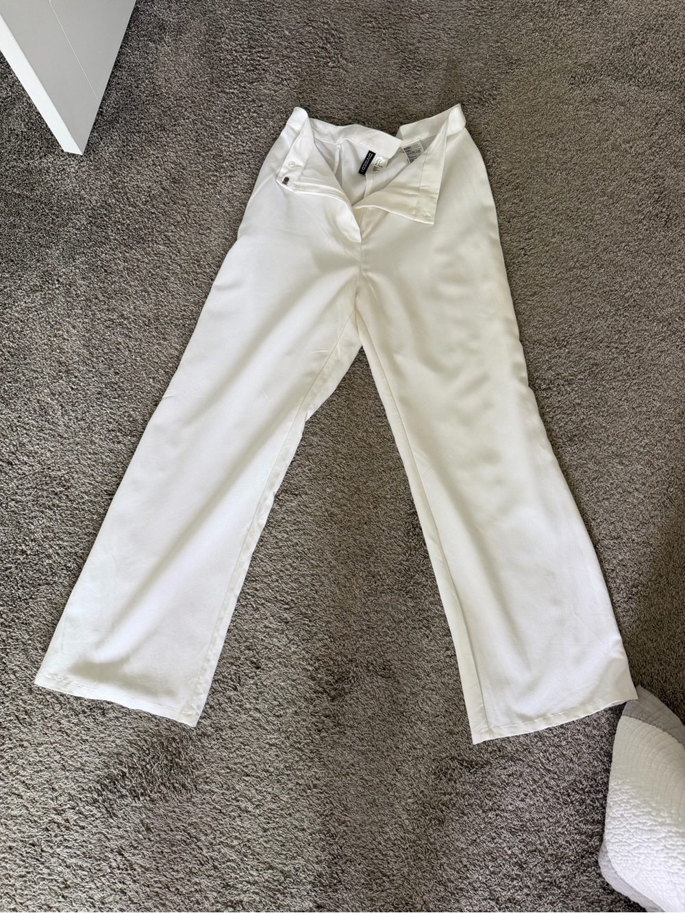 Never worn: white pants